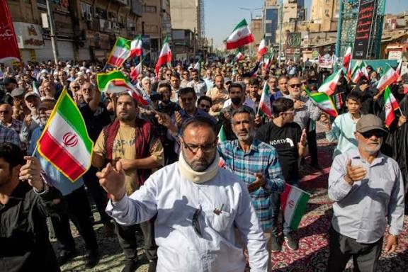 Protesters set fire to police motorcycles and government buildings during anti-government demonstrations in Iran, as unrest spreads across multiple cities.
