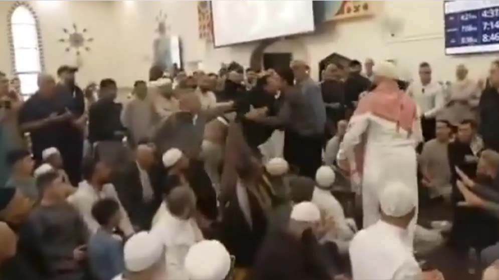 Protesters asking the Australian Prime Minister to leave a mosque during Eid event in Sydney