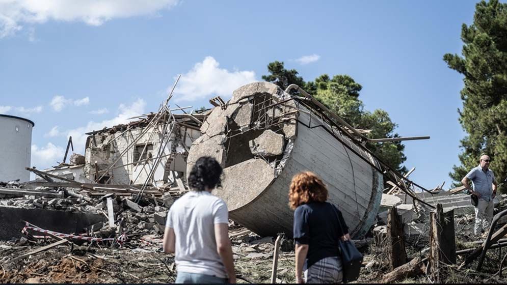 Explosion aftermath in Jerusalem area after Iranian missile strike with emergency responders on site
